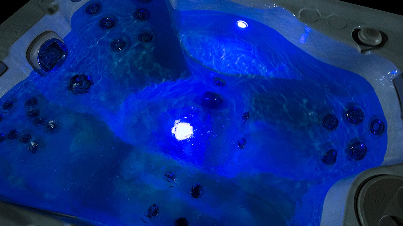 Hydropool Serenity 395 filled interior. Blue lighting